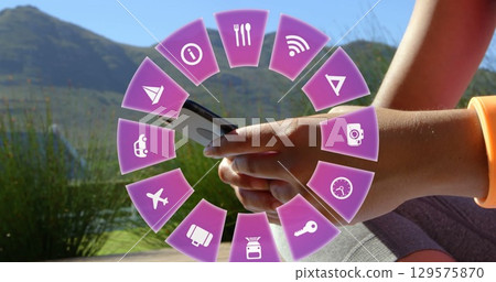 Image of travel icons and caucasian woman using smartphone in background Image of travel icons and caucasian woman using smartphone in background 129575870