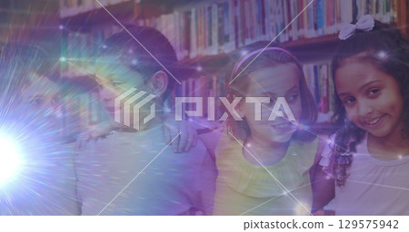 Image of light trails and network of connections over diverse schoolchildren 129575942