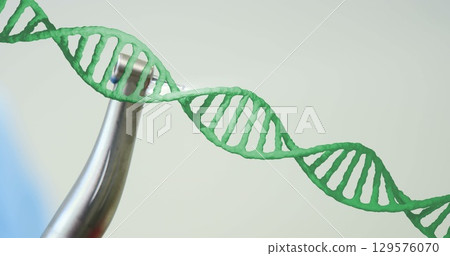 Image of dna strand over dental drill 129576070