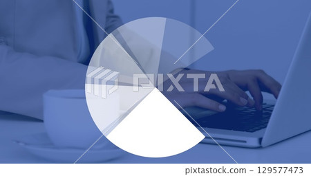 Image of pie chart rotating in loop over midsection of caucasian businessman using laptop 129577473