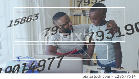 Image of data processing over african american man with his son using laptop 129577514