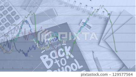 Image of line graph and welcome back to school text on tablet screen with stationery on table Image of line graph and welcome back to school text on tablet screen with stationery on table 129577564