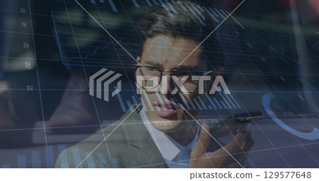 Image of financial data processing over business people working in office 129577648