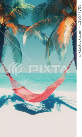 A peaceful beach scene with a hammock swaying gently between palm trees. The turquoise water meets the sandy shore. A perfect escape for relaxation. Generative AI 129577706