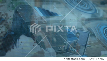 Image of data processing over businesswoman having laptop image call with colleague Image of data processing over businesswoman having laptop image call with colleague 129577787