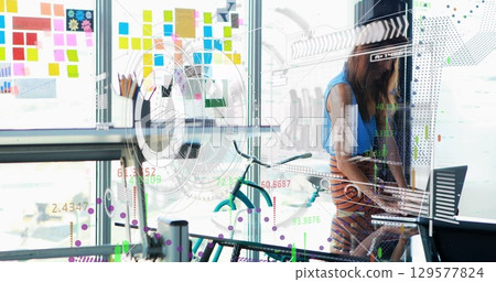 Image of statistics and financial data processing over caucasian businesswoman in office 129577824