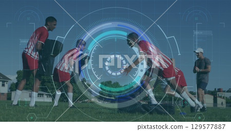 Image of scope and data processing over diverse football players exercising on pitch 129577887