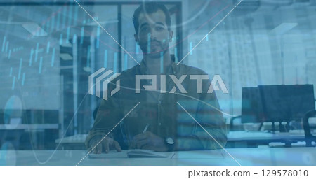 Image of financial data processing over businessman 129578010