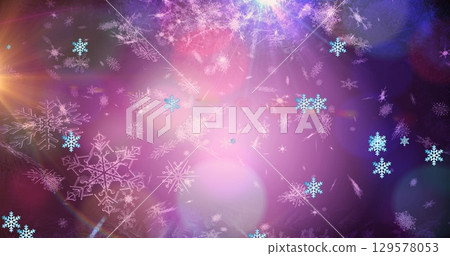 Image of light spots over snow falling Image of light spots over snow falling 129578053