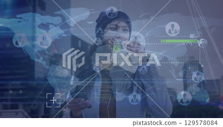 Image of data processing over world map against asian woman having a snack on the street 129578084