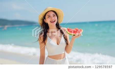 A woman eating watermelon deliciously 129578597