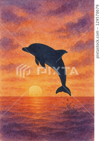 Dolphins jumping in the sea at sunset Dolphins jumping in the sea at sunset 129578679