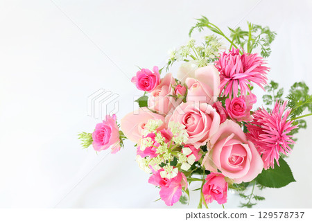 Pink rose and gerbera arrangement 129578737
