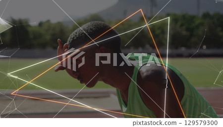 Image of hexagons and triangles over african american man tired after run 129579300