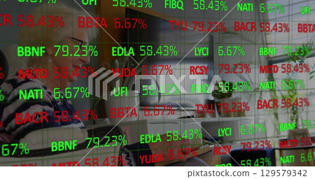 Image of financial data over senior caucasian woman reading book 129579342