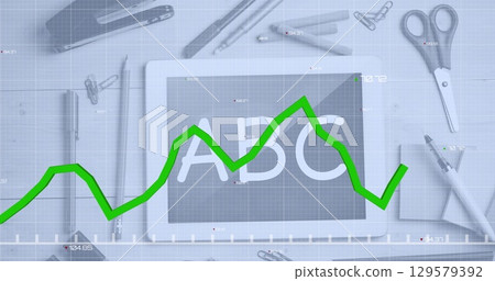 Image of green graph over digital tablet screen with abc text and stationery on table Image of green graph over digital tablet screen with abc text and stationery on table 129579392