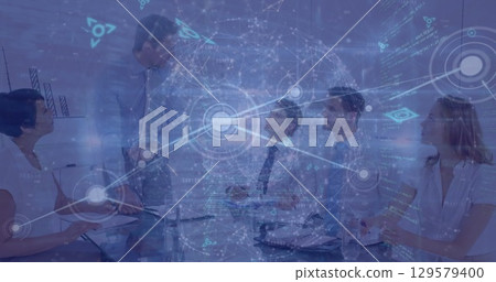 Image of rotating globe over caucasian coworkers discussing in meeting in boardroom 129579400