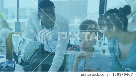Image of data processing over diverse scientists Image of data processing over diverse scientists 129579407
