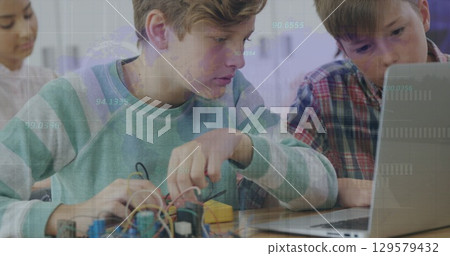 Image of network of connections over students using computers 129579432