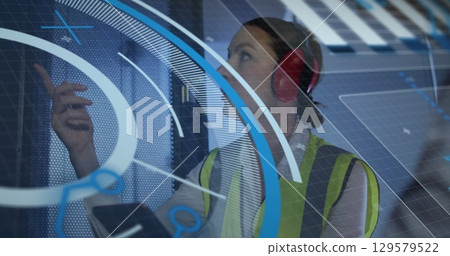 Image of data processing over caucasian female worker in server room Image of data processing over caucasian female worker in server room 129579522