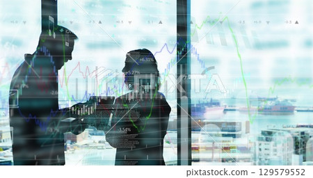 Image of statistics and financial data processing over diverse business people in office 129579552