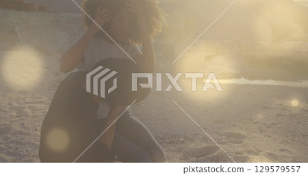 Image of network of connections over woman and man exercising outdoors 129579557