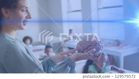 Composition of happy caucasian two businessmen shaking hands over cityscape 129579572