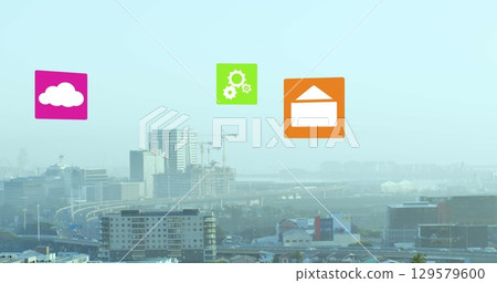 Image of multiple digital icons against aerial view of cityscape 129579600