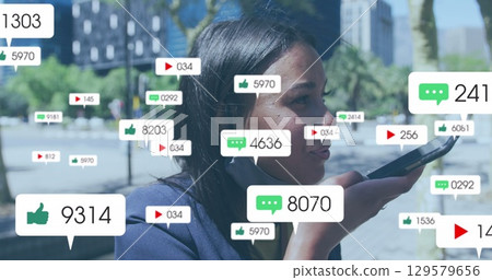 Social media icons and digital icons over increasing numbers against cityscape Social media icons and digital icons over increasing numbers against cityscape 129579656