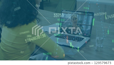 Image of financial data processing over caucasian businesswoman on image call 129579673
