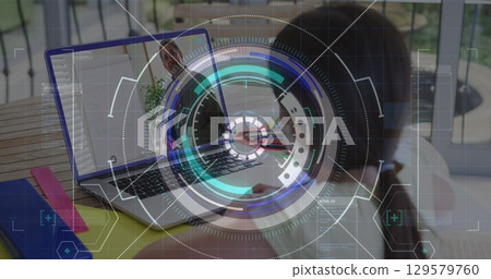 Image of round scanner and data processing over rear view of girl having a image call on laptop 129579760