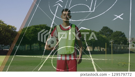 Image of game plans over football player at stadium Image of game plans over football player at stadium 129579772