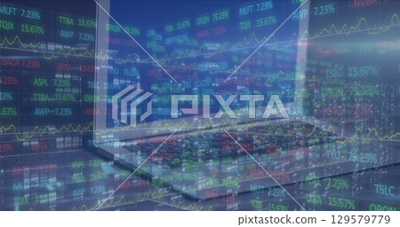 Displaying multicolored stock tickers fluctuating on trading floor with monitors and keyboards Displaying multicolored stock tickers fluctuating on trading floor with monitors and keyboards 129579779