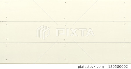 Background image of a horizontal wooden wall painted ivory with nails 129580002
