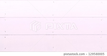 Background image of a horizontal wooden wall painted pale pink with nails Background image of a horizontal wooden wall painted pale pink with nails 129580005