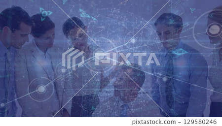 Image of computer language and globe over multiracial coworkers discussing with boss in office 129580246