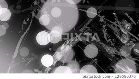 Image of grey and white circles of light over moving white brush strokes on black background Image of grey and white circles of light over moving white brush strokes on black background 129580376
