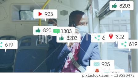 Image of social media icons over santa speech bubbles 129580472