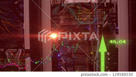 Displaying rack with blinking LEDs, Ethernet cables in datacenter, overlay chart with upward arrow 129580530