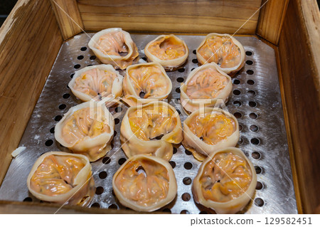 Korean traditional food. Kimchi steamed dumplings Korean traditional food. Kimchi steamed dumplings 129582451