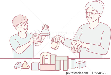 Loving grandmother play toys with grandson Loving grandmother play toys with grandson 129583229