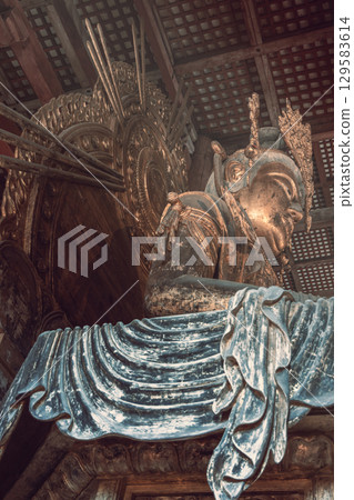 Bodhisattva figure with halo inside Todai ji Temple Nara Bodhisattva figure with halo inside Todai ji Temple Nara 129583614