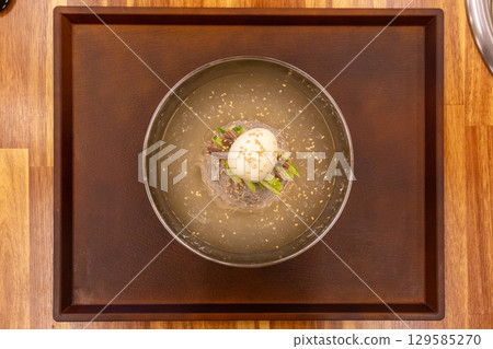 Korean traditional food. Cold buckwheat noodles Korean traditional food. Cold buckwheat noodles 129585270