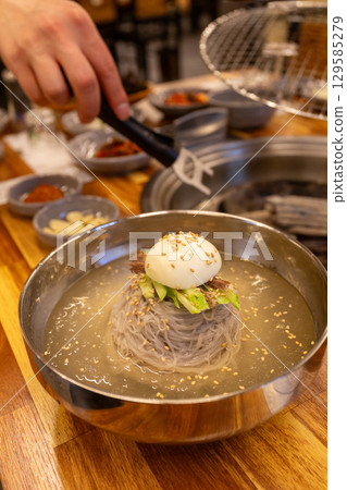 Korean traditional food. Cold buckwheat noodles 129585279