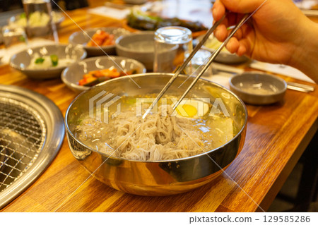 Korean traditional food. Cold buckwheat noodles 129585286