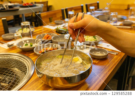 Korean traditional food. Cold buckwheat noodles Korean traditional food. Cold buckwheat noodles 129585288