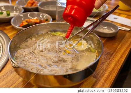 Korean traditional food. Cold buckwheat noodles 129585292