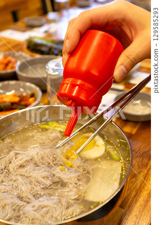 Korean traditional food. Cold buckwheat noodles 129585293