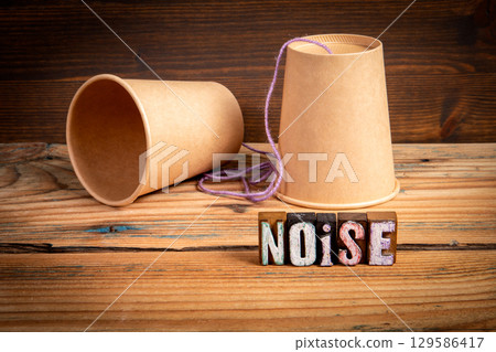 Vintage Toy Phone with Noise Concept Highlighting Disruption in Communication 129586417