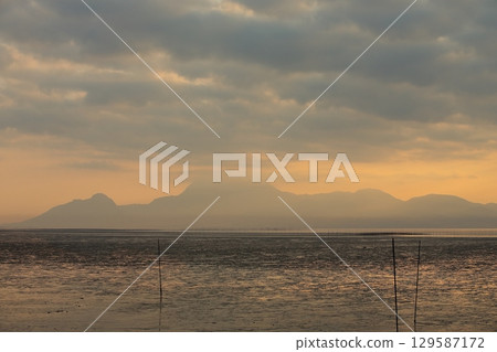 Arao City coast at dusk 129587172